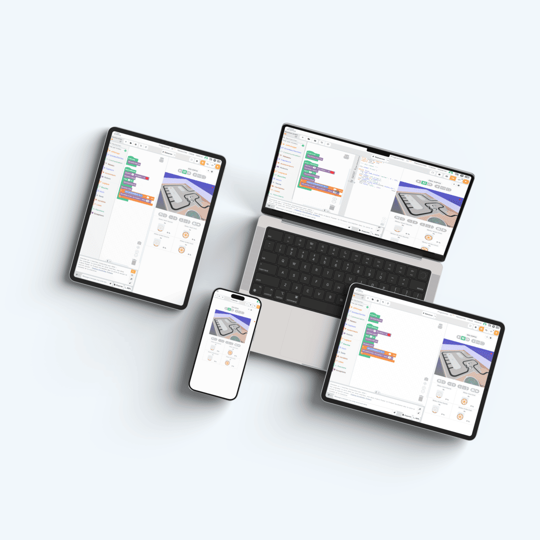 Un ordinateur portable, une tablette et un smartphone montrant une utilisation de la plateforme Vittascience pour programmer des robots ilo